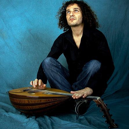 Smadj posing with the oud instrument